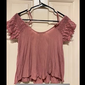 American Rag shirt that has lace on sleeves and straps to keep up, beautiful on